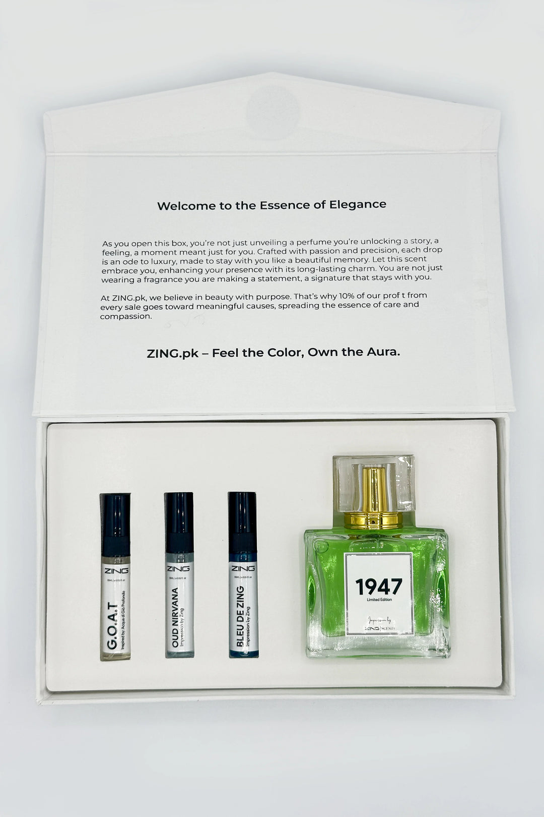 1947 perfume bottle with three tester bottles of G.O.A.T, Oud Nirvana and Bleu De Zing in box with lid open and thank you text printed on lid