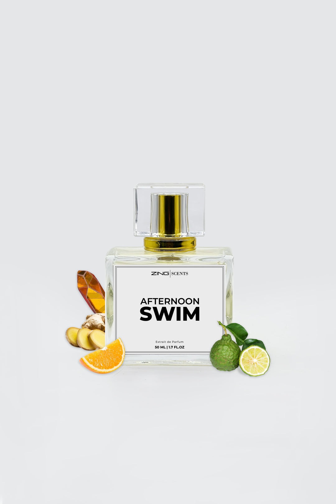 afternoon swim perfume bottle with golden nozzle shown in grey background with fragrance related elements on sides of perfume bottle