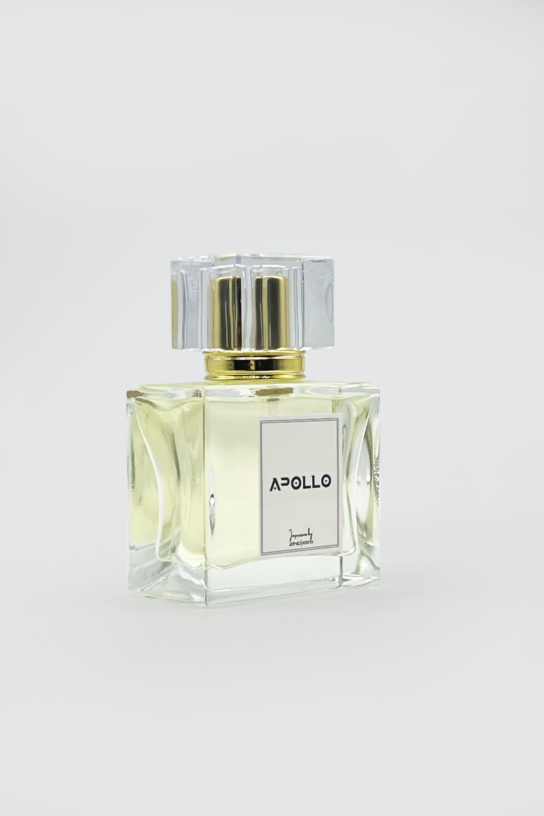 premium perfume bottle of apollo with golden sprayer displayed on grey background