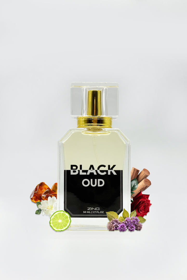 black oud perfume bottle displayed on grey background with fragrance related elements on sides of bottle