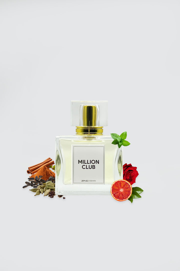million club perfume bottle displayed with roses, cardamom, and other scent related ingredients on sides of bottle
