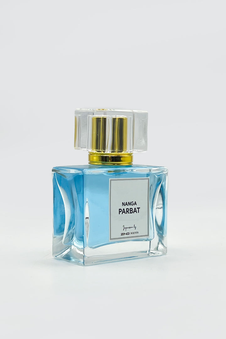 nanga parbat perfume bottle with golden sprayer shown on grey background