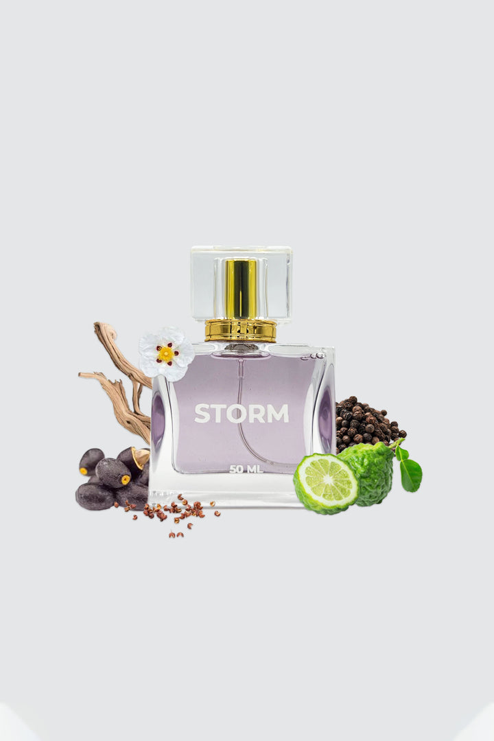 light purple color storm perfume displayed with scent related ingredients on sides of bottle