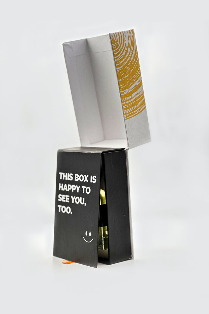 Sultan 100ml perfume bottle shown in box along with its outer that has sultan written in calligraphy style displayed on a white background