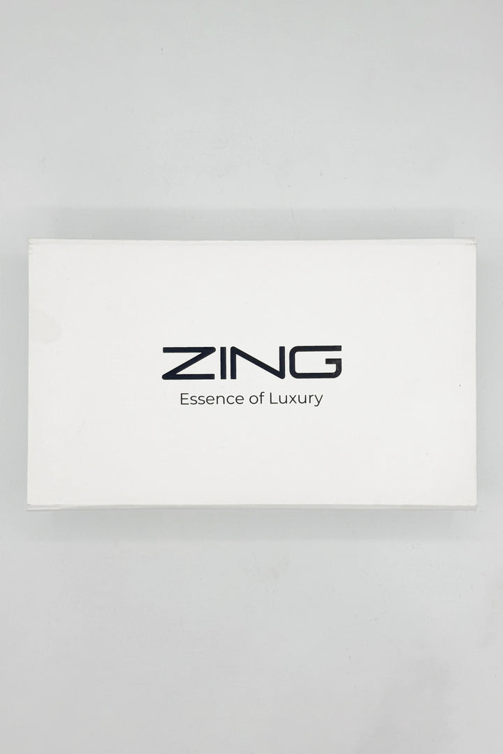 ZING white bundle box with text ZING Essence of Luxury written on top