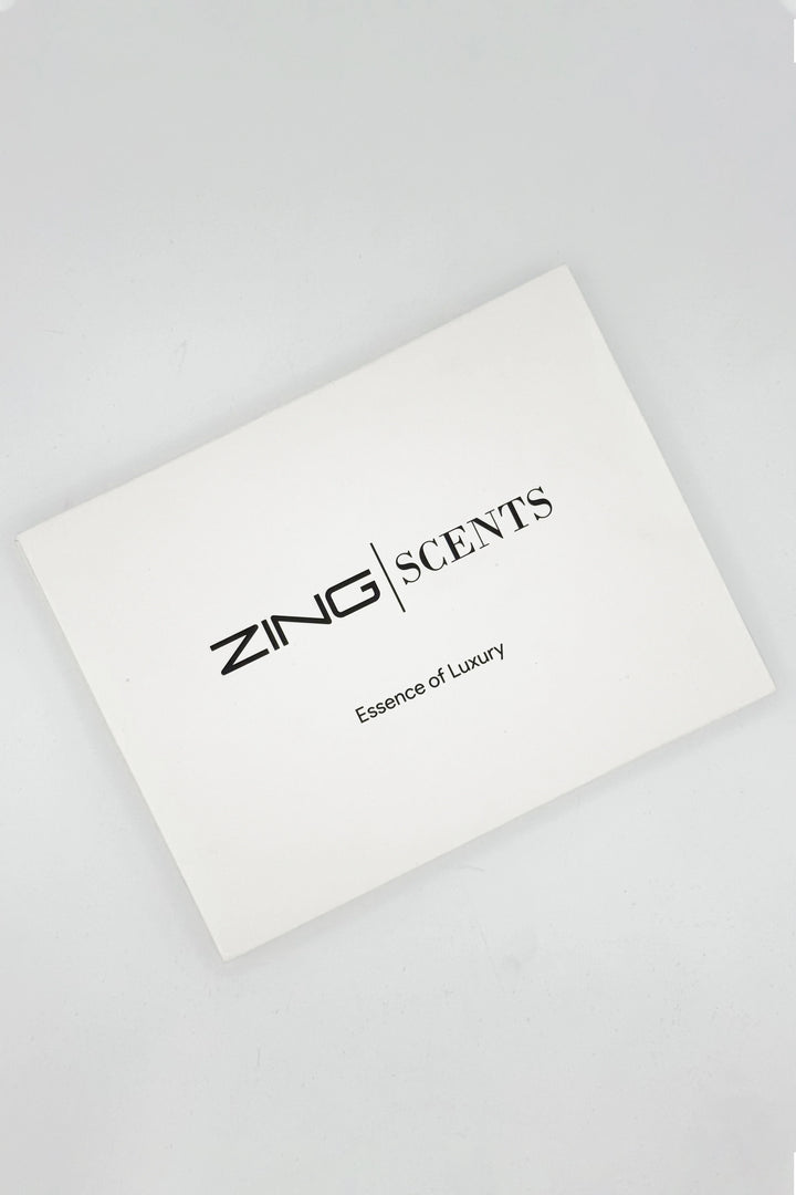 ZING scents white bundle box with text ZING Essence of Luxury written on box displayed on white background.